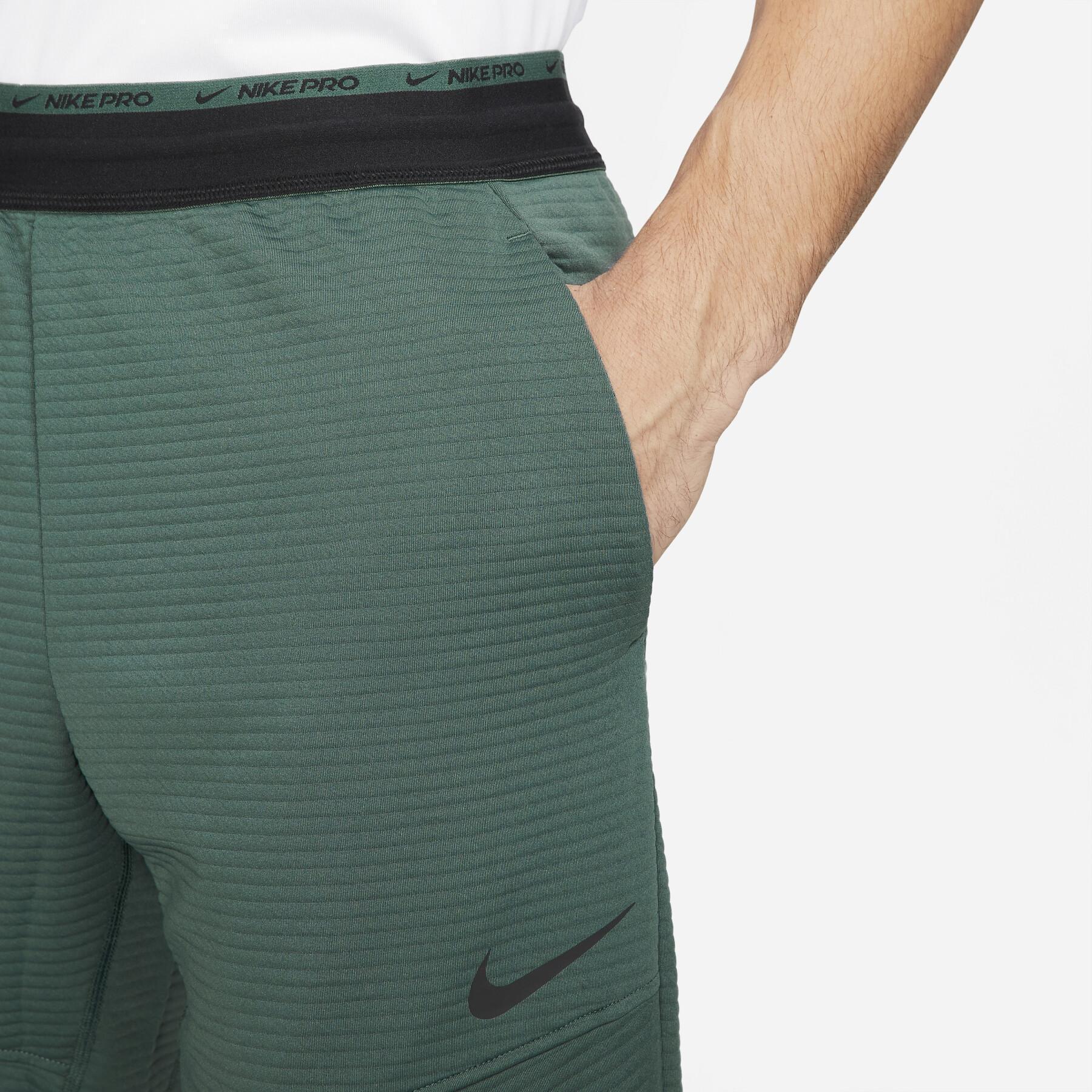 Joggingdräkt i fleece Nike NPC Fleece